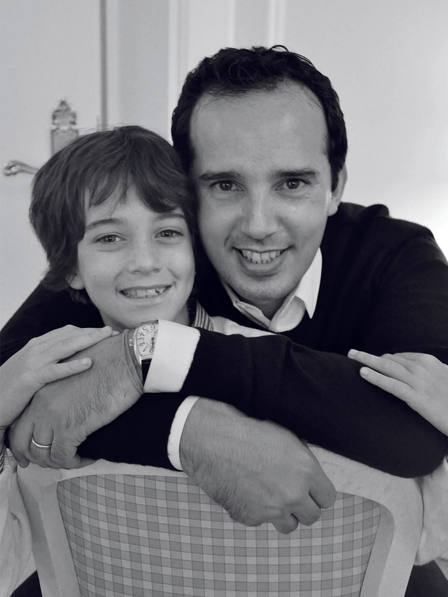 Taha Bouqdib with his son, Adam, in Paris.