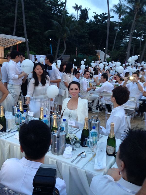 Fann Wong glowing in her white outfit.
