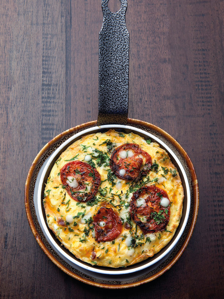 Bochinche's chorizo with grilled tomatoes and provolone cheese is a savoury treat to start your day.