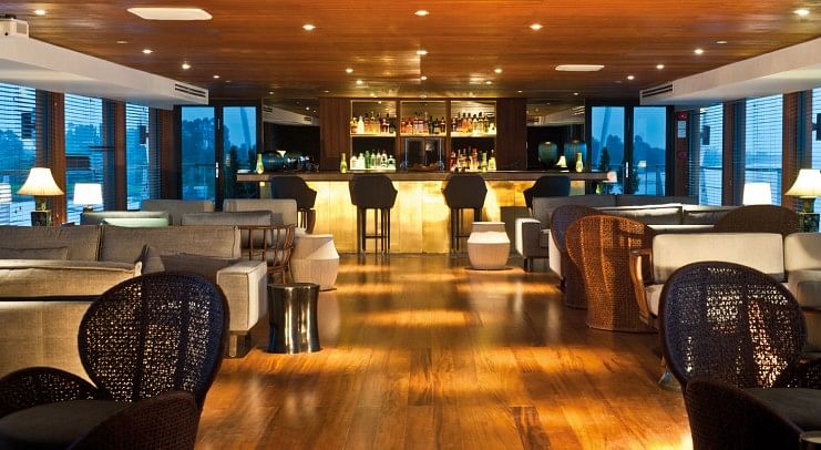 Francesco Galli Zugaro designed spaces where guests could mingle freely on Aqua Mekong, like its contemporary bar which is designed by Singapore's Proof and Company.
