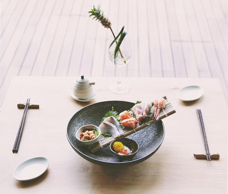 The zen atmosphere of the restaurant filters right down to the minimalist table setting. All cutlery is placed in symmetry and food is meticulously plated – even the ubiquitous sashimi set. 