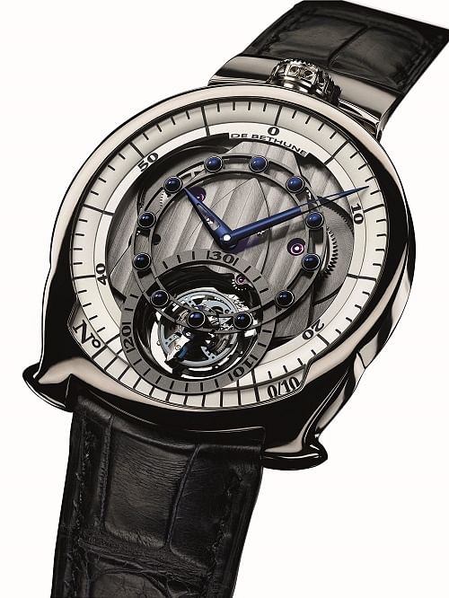 De Bethune celebrates the 10th anniversary of the DBS watch with the DBS Tourbillon. Its lightweight tourbillon is made from materials like titanium and silicon.