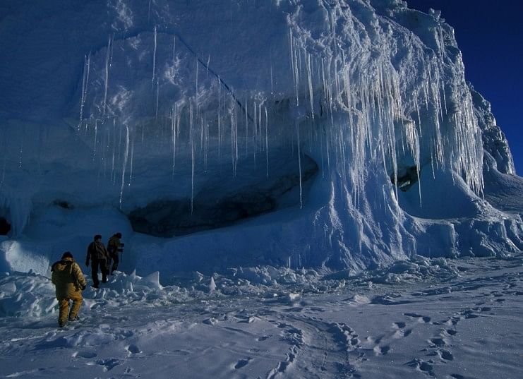 Hiking on ice shelf and exploring ice cave