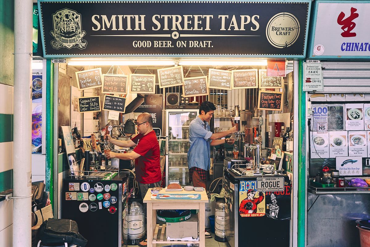 SMITH STREET TAPS The city’s first bar with craft beer on tap, this is the unofficial hangout for beer geeks all over town. Ask for a recommendation of the day’s beers – their names, abvs and beer styles hang on chalkboards fringing the stall front – which can range from entry-level Sapporo to hop bomb Imperial IPA and roasty Russian Imperial Stout styles that change on an almost daily basis. Its Facebook page also announces the occasional tap takeover – geek speak for when a particular brewery dominates up to 12 taps on the evening’s line-up – so stay tuned. #02-262 Chinatown Complex, 335 Smith Street.