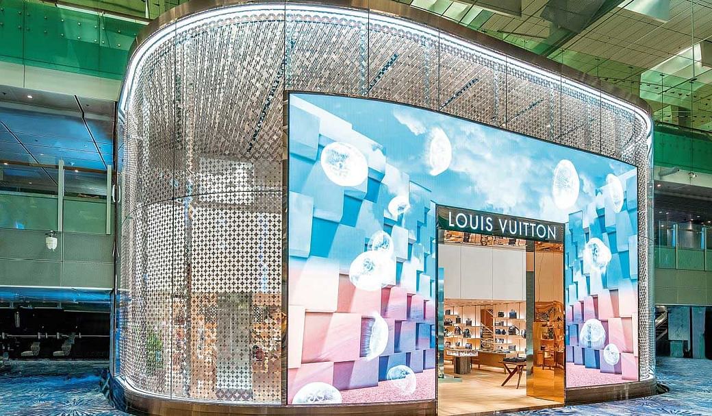 The first Louis Vuitton airport store with a digital entrance at Changi  Airport Terminal 3, Singapore, Southeast Asia Stock Photo - Alamy