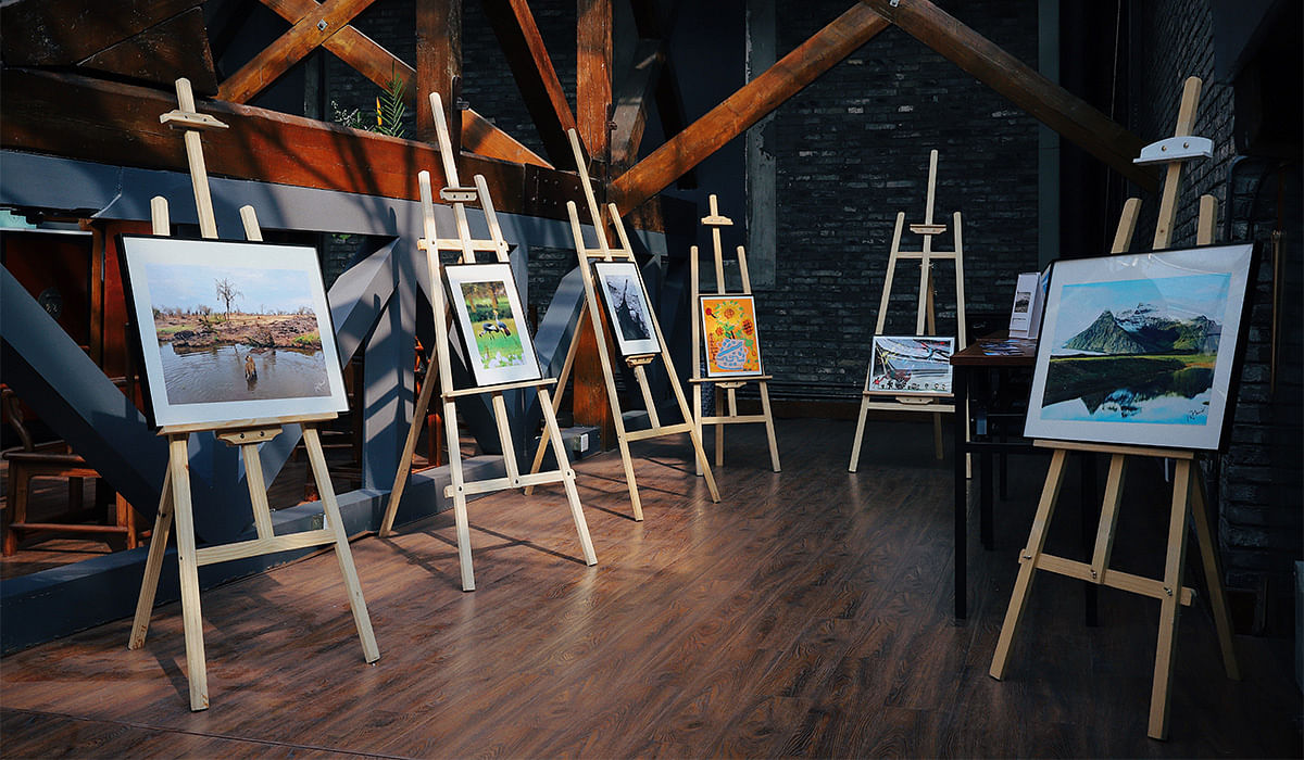 Collection of easels, assorted painting, art collection