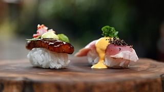 Inka nigiri duo with tuna tataki and soy-pisco braised pork jowl