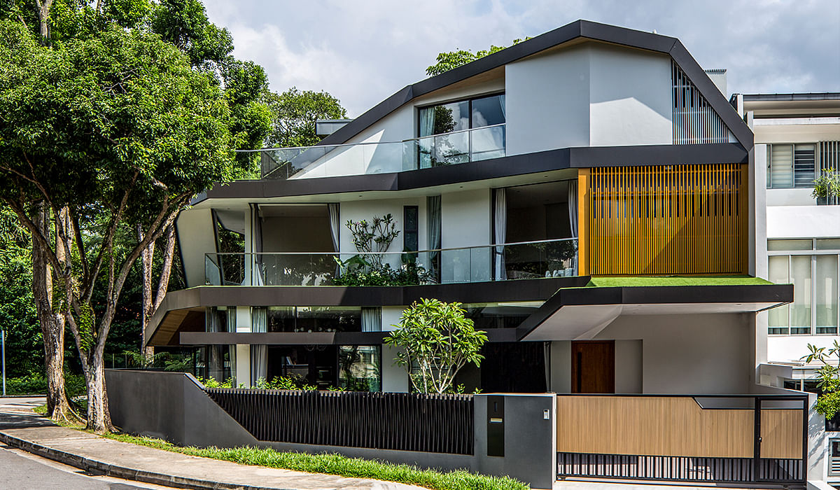 Three-storey landed house in Singapore with verandas.