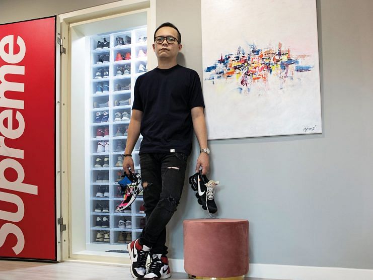 Francis Tan wearing Nike Air Jordan 1, carrying Nike Air Presto x Acronym and Air VaporMax Off-White