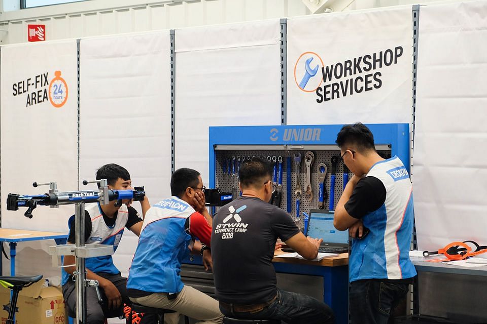 The Decathlon Singapore Lab provides more than just sports products; customers can find tools and assistance to repair their bicycles at a 24-hour workshop in the store. 