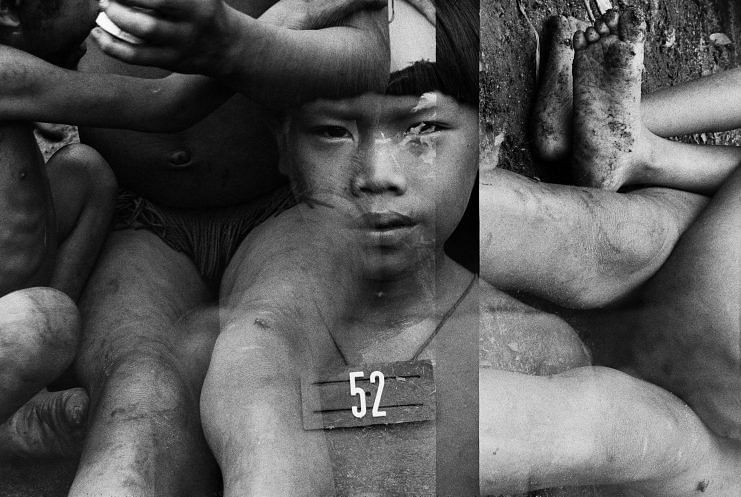 A boy given a number as part of a vaccination programme, shot by Claudia Andujar