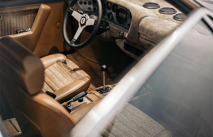 Auer launched a business offering bespoke designs for the interiors of luxury cars, such as the Ferrari Dino.