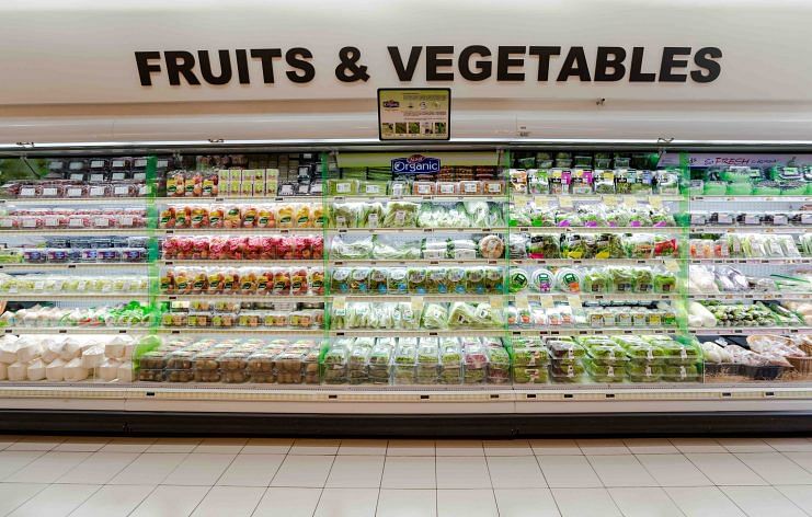 The fruits and vegetables section of a FairPrice supermarket.