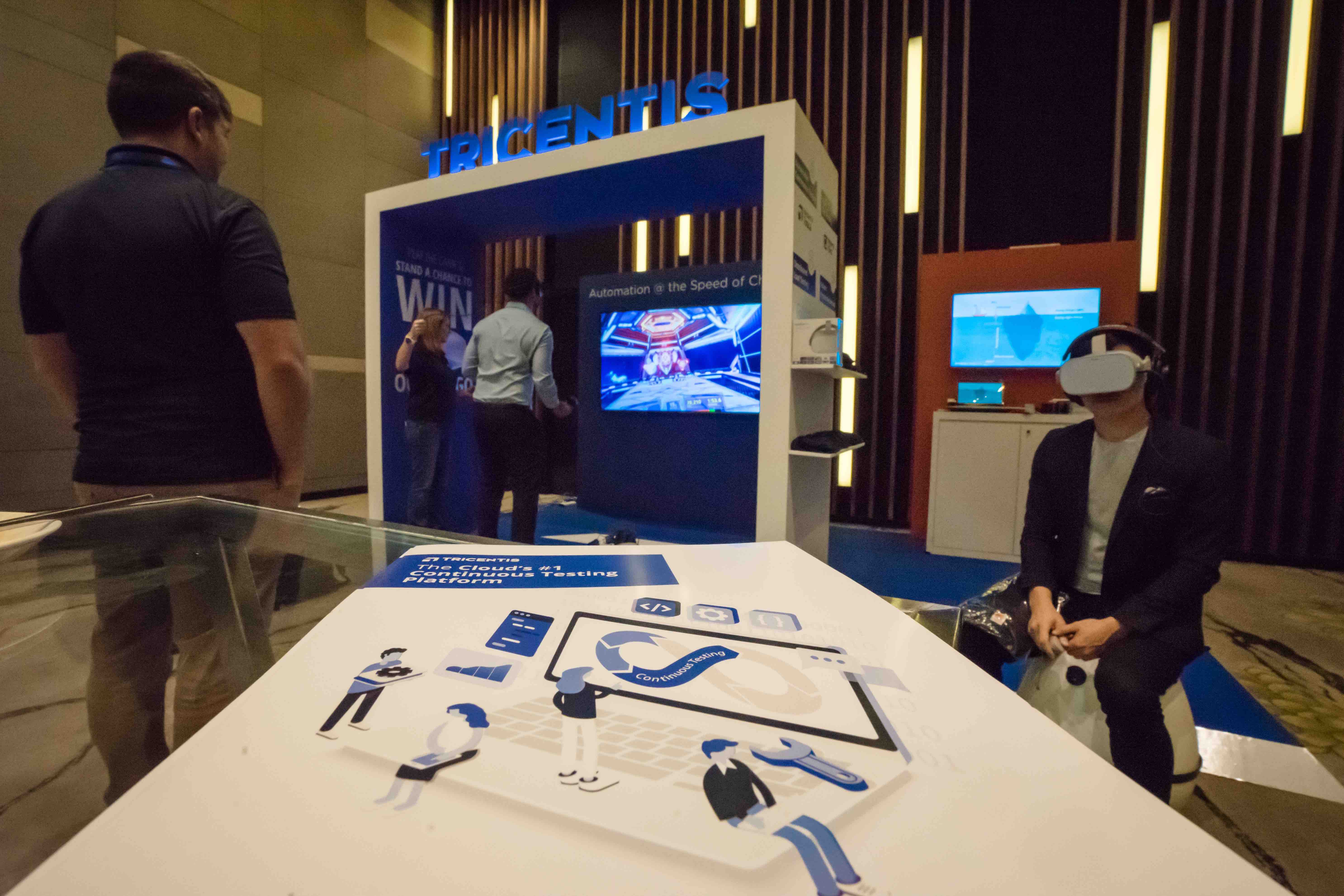 Tricentis exhibiting its solutions.