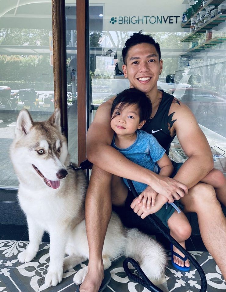 Leon Qiu with his son Jude and the pet husky.