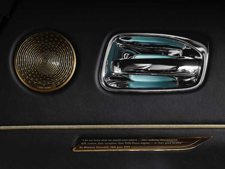 The inscription, fashioned out of brass, on the driver's door of the Rolls Royce Wraith Eagle VIII.