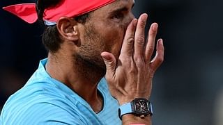 Spain's Rafael Nadal, wearing a watch, reacts as he plays against Italy's Jannik Sinner during their men's singles quarter-final tennis match on Day 10 of The Roland Garros 2020 French Open tennis tournament in Paris on October 6, 2020. (Photo by MARTIN BUREAU / AFP) (Photo by MARTIN BUREAU/AFP via Getty Images)