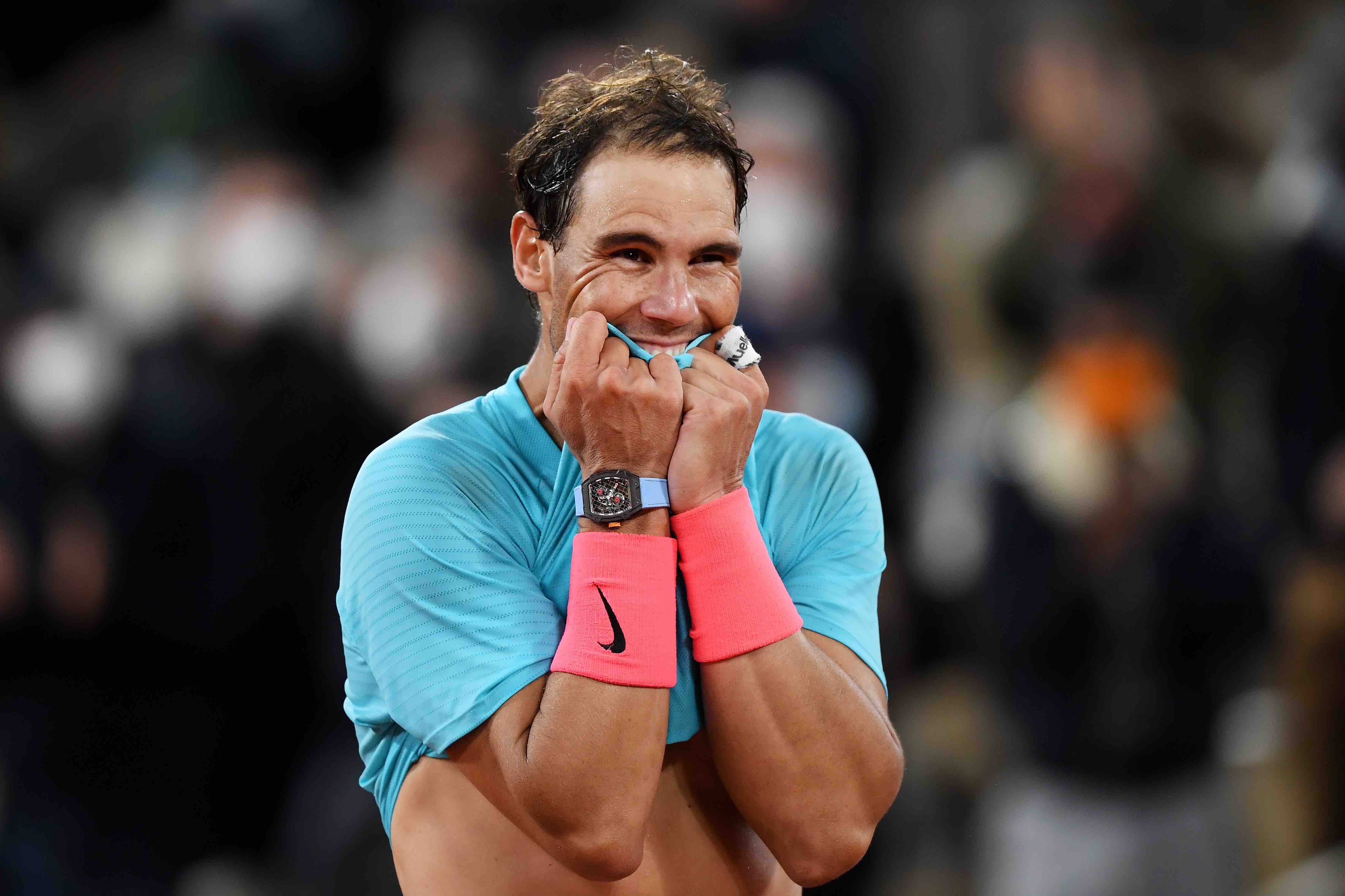 Rafael Nadal moments after his championship-winning shot. The RM 27-04 is on his right wrist. (Photo by Shaun Botterill/Getty Images)