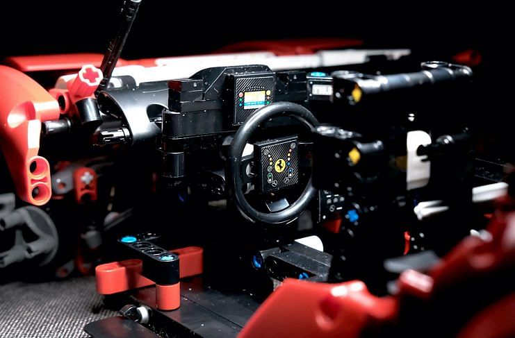 A close-up look at the steering wheel on the Lego Technic Ferrari 488 GTE.