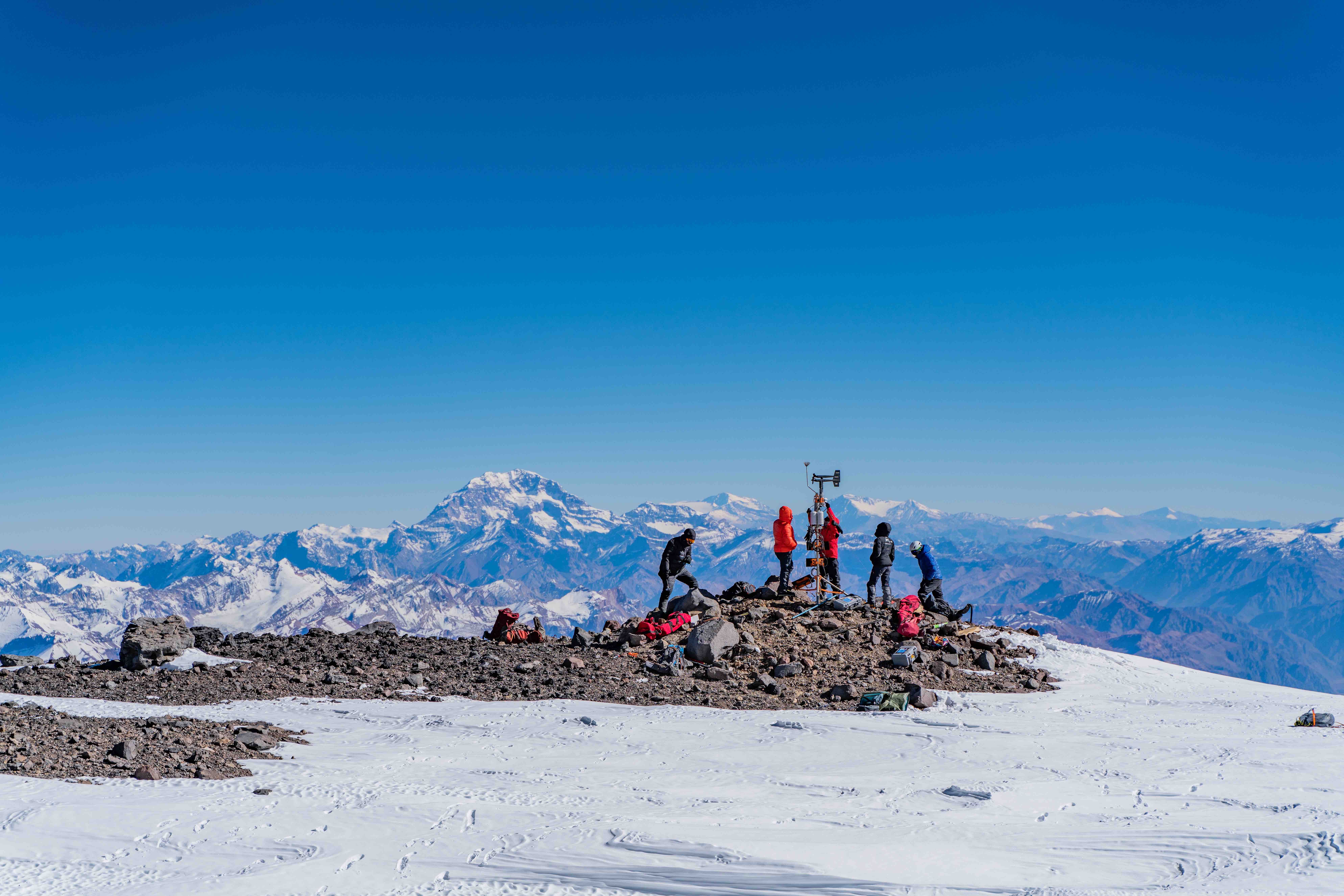 The expedition team installs the highest weather station in the Southern and Western Hemispheres at 6,505 metres. Photo shot by Armanda Vega for National Geographic.