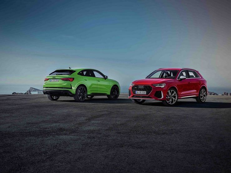 The Audi RS Q3 Sportback in Kyalami green (left) and the Audi RS Q3 in red.