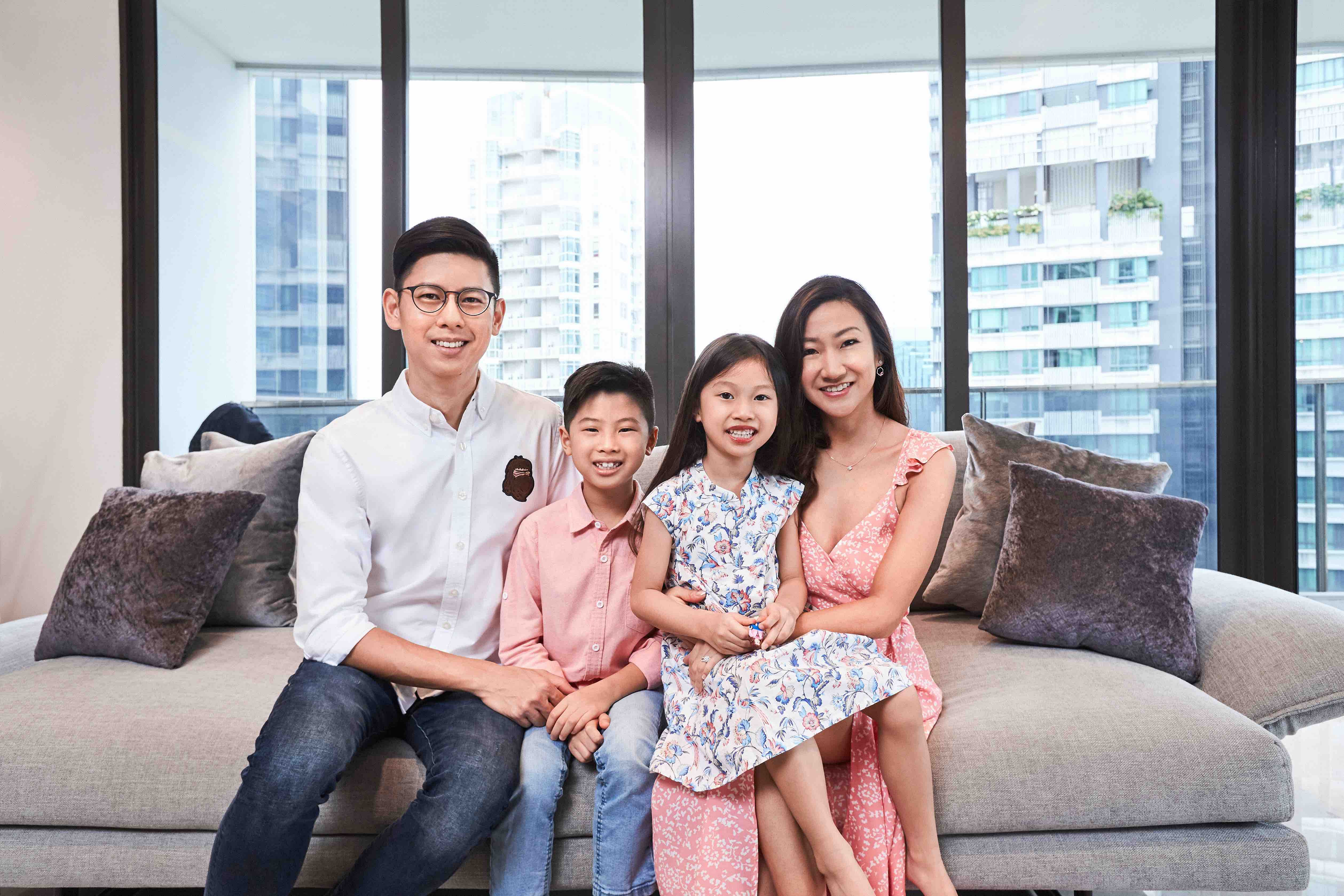Dr Claudine Pang and her husband, Aaron with their two kids.