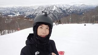 Joshua Lung, founder of Healing Touch, skiing.