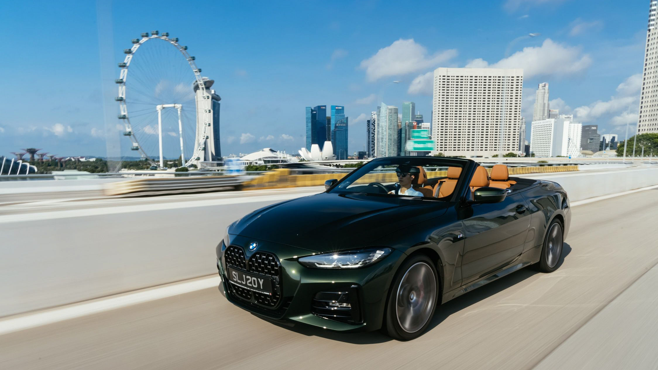 The BMW 4 Series Convertible being driven in Singapore.