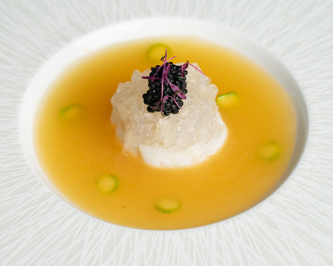 Braised Scallop Dumpling filled with Bird's Nest and Bamboo Fungus in Supreme Broth