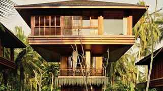 On Bali’s west coast, Lost Lindenberg offers breezy, treehouse-style rooms perched on elegant wooden towers — inviting guests to connect with the natural surroundings.