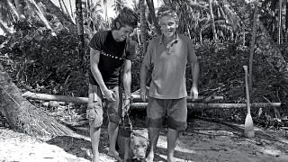 Gauthier Toulemonde (left) with Docastaway founder Alvaro Cerezo and the dog he borrowed to drive away rats and snakes.