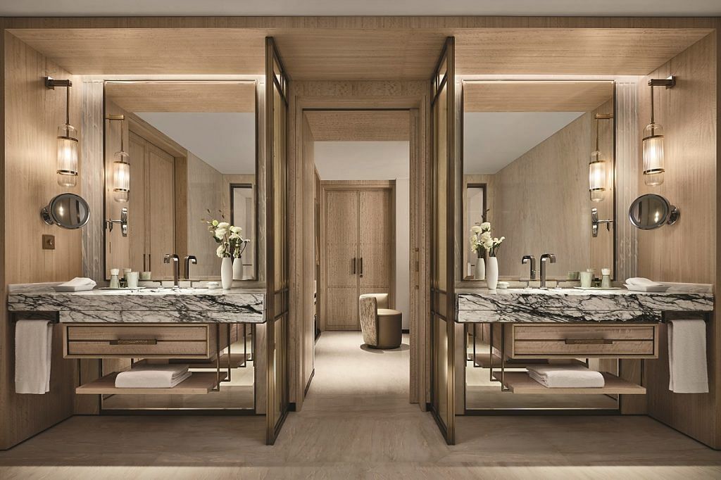 The bathroom is an urban retreat with his and hers vanities (Credit to Marina Bay Sands)